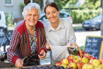 Senior and Staff Member at the Market